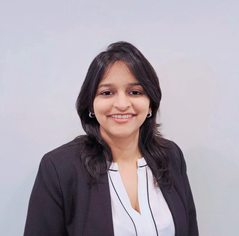 Board member female smiling at camera in smart professional clothing